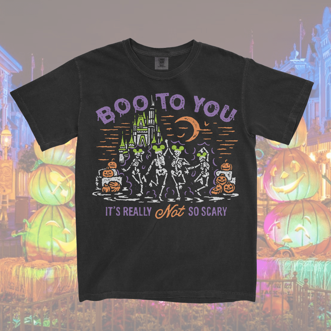 a Not So Scary shirt,  a MNSSHP Inspired t-shirt with dancing skeletons and magic castle located in Magic Kingdom located at Disney World and Disneyland. It is part of the Boo To You Parade. 