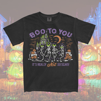 a Not So Scary shirt,  a MNSSHP Inspired t-shirt with dancing skeletons and magic castle located in Magic Kingdom located at Disney World and Disneyland. It is part of the Boo To You Parade. 