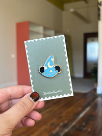 Blue Sorcerer Hat with Mickey ears enamel pin on Main Street Tourist backing card, Fantasia Disney inspired enamel pin for trading.