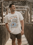 Man wearing a Rivers Of The World shirt,  a Disney Jungle Cruise inspired vintage t-shirt with riverboat and tropical design located in Magic Kingdom located at Disney World and Disneyland